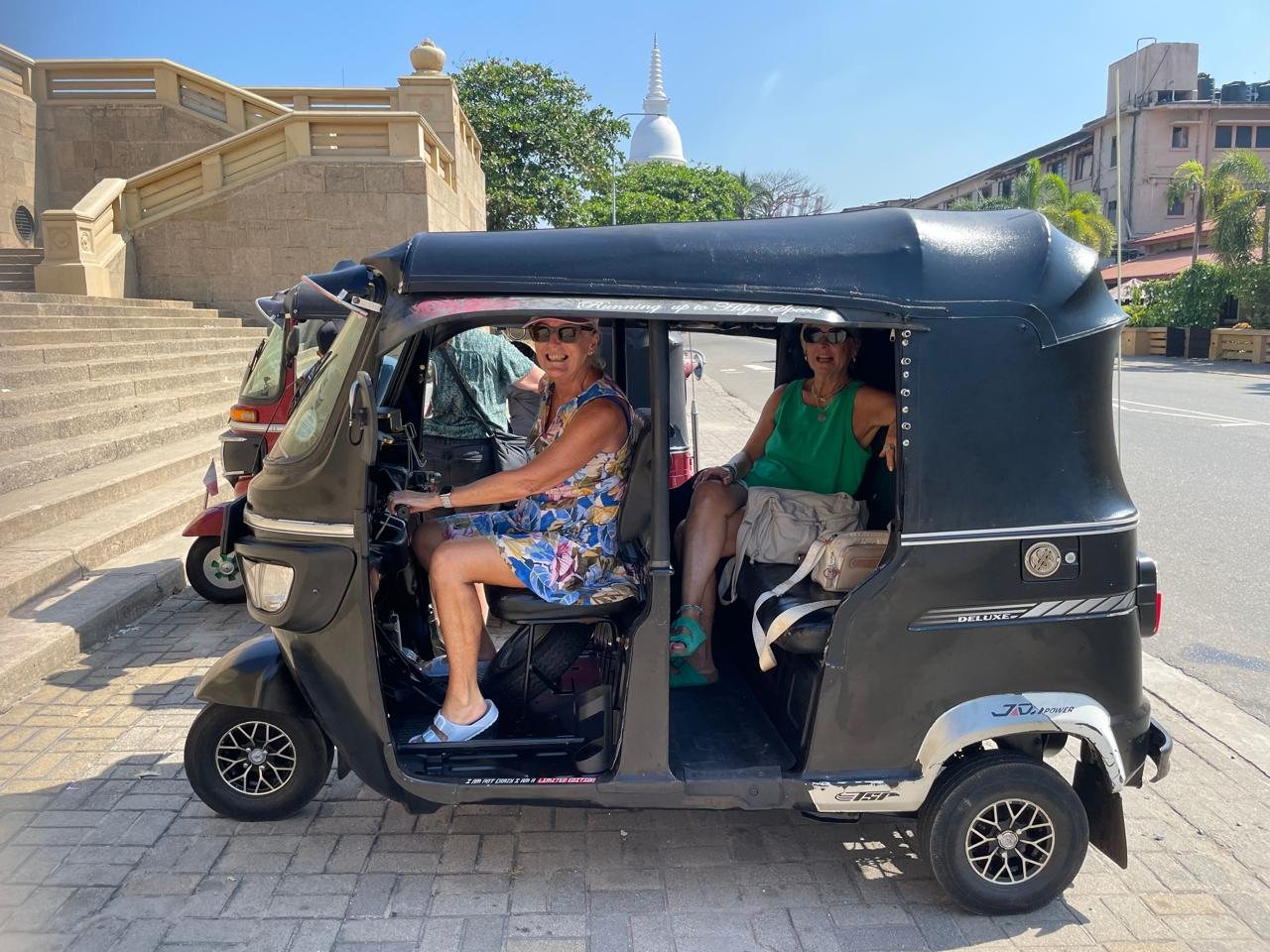 Guests enjoying a private Colombo tuk tuk tour with a local guide
